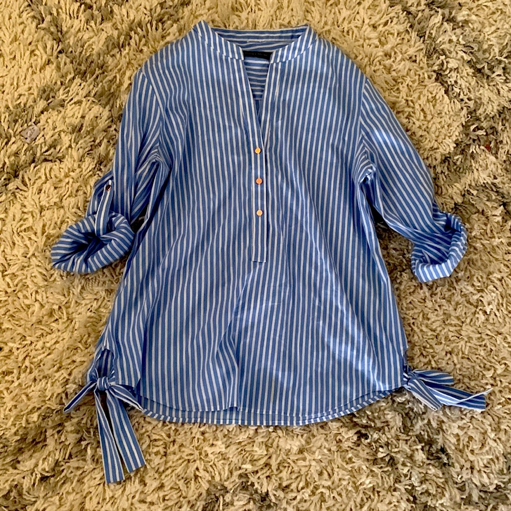 Blue and white striped blouse.